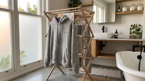 The Ultimate Hoodie Lifestyle Magazine 7 Oversized luxury hoodie hanging on wooden drying rack